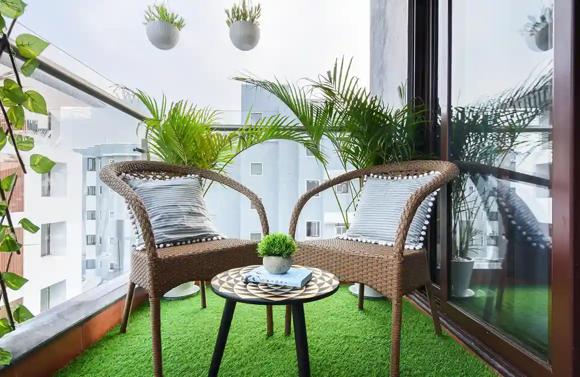 An outhouse balcony Interior Design that talks with nature in Bangalore by Interiosplash interior design company